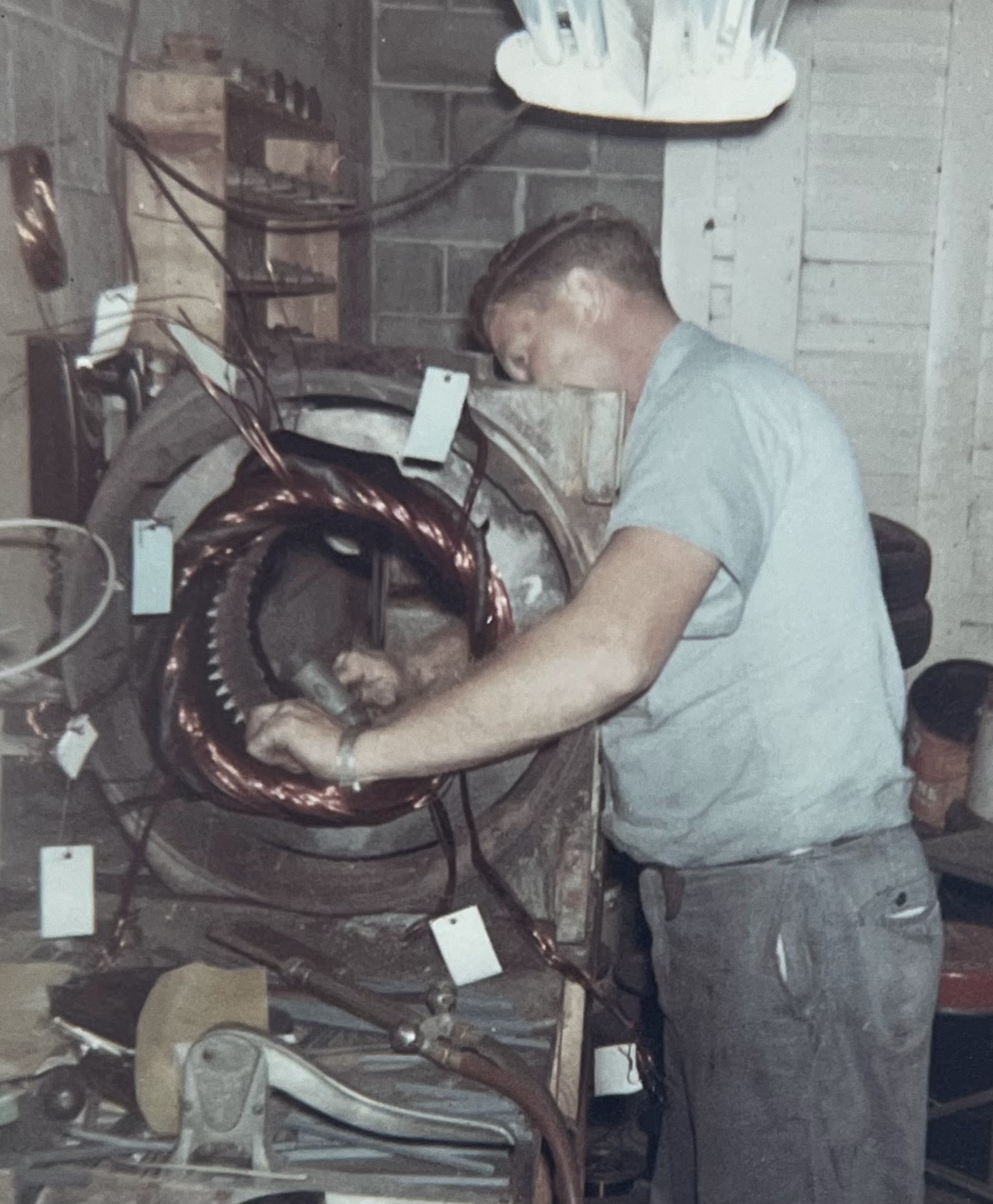Mr. Gus putting coils in a motor